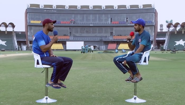 Shan Masood (left) in conversation with Babar Azam. —Screengrab/ YouTube/ @pakistancricket/ File