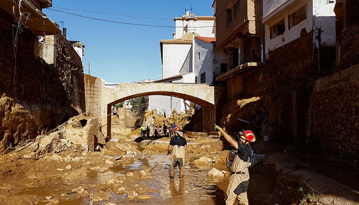 Search and rescue team members and Spanish Civil Guards look for bodies, following heavy rains that caused floods, in Chiva, Spain, November 2, 2024. — Reuters