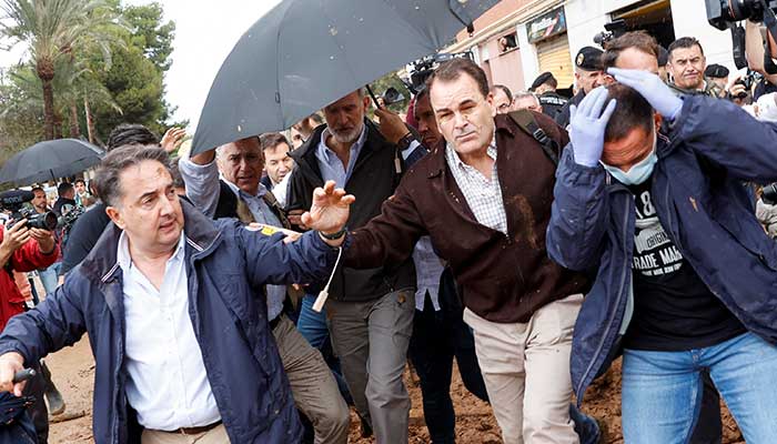 People throw mud at Spains King Felipe, following heavy rains that caused floods, as he visits Paiporta, near Valencia, Spain, November 3, 2024. — Reuters