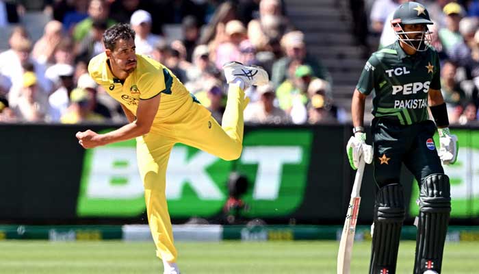 Pakistan's Babar Azam watches as Australia's Mitchell Starc takes a delivery during the first ODI at MCG on November 4, 2024. – AFP