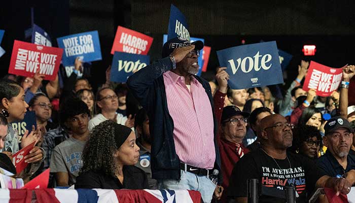 A man salutes during Harris-Walz Campaign Rally by Arizona Democratic Party at Celebrity Theatre in Phoenix, Arizona, US November 4, 2024. — Reuters