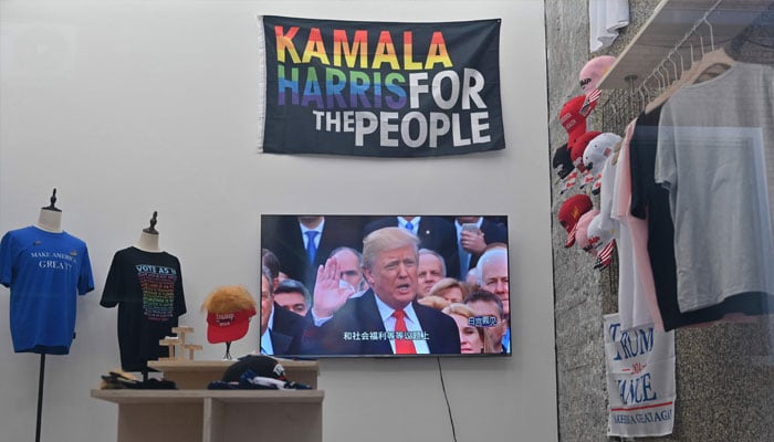 This picture shows an exhibition by Chinese artist Dong Dawei titled Yiwus choice of the world, a collection of US election merchandise made in Yiwu - a manufacturing hub in eastern Chinas Zhejiang province, on display at a gallery in Beijings 798 art district on November 5, 2024. — AFP