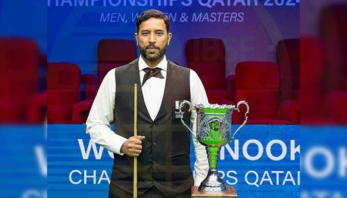 Pakistans Muhammad Asif poses with the trophy after winning his third IBSF title on November 6, 2024. — Instagram/@ibsf.media