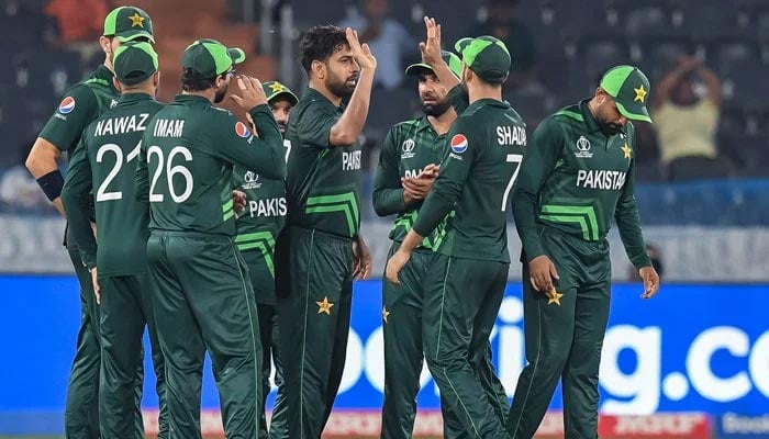 Pakistan pacer Haris Rauf celebrates with teammates after taking the wicket of Netherlands captain Scott Edwards during World Cup 2023 on October 6, 2023. — AFP