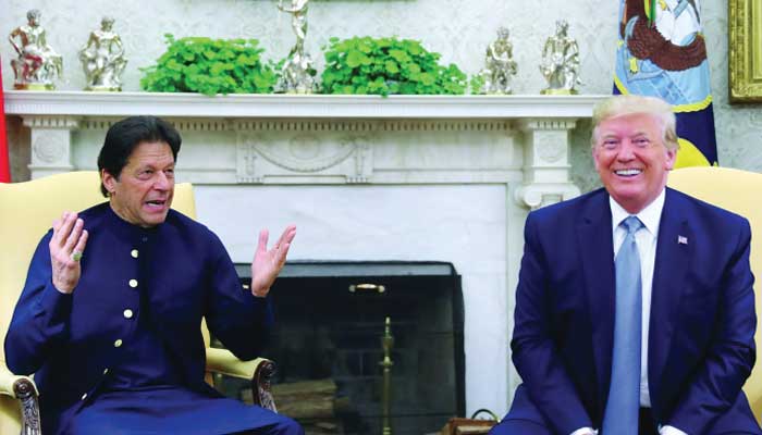 Former prime minister Imran Khan meets with former US President Donald Trump in the Oval Office of the White House in Washington, on July 22, 2019. — Reuters