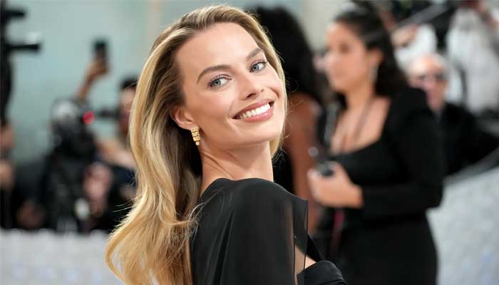 Margot Robbie steps out in L.A with her newborn baby boy