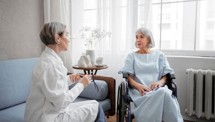 A representational image depicting a doctor attending her patient. — Freepik