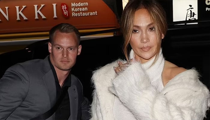 Jennifer Lopez reveals her new handsome bodyguard.