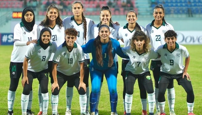 Members of Pakistan women football team are seen in a group photo. — PFF/File