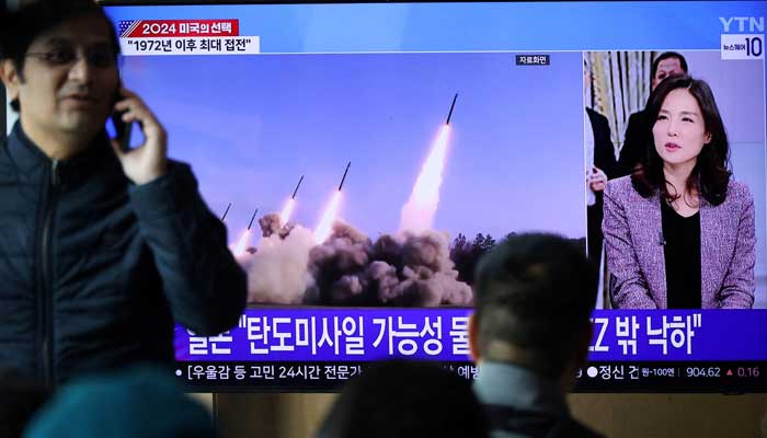 People watch a TV broadcasting a news report on North Korea firing missiles that flew 400 km after lifting off at around 7:30am from Sariwon, just south of the capital Pyongyang, at a railway station in Seoul, South Korea, November 5, 2024. — Reuters