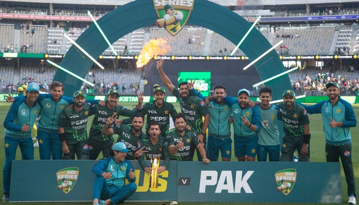 Pakistan players pose with the trophy after winning the three-match ODI series against Australia in Perth on November 10, 2024. — AFP