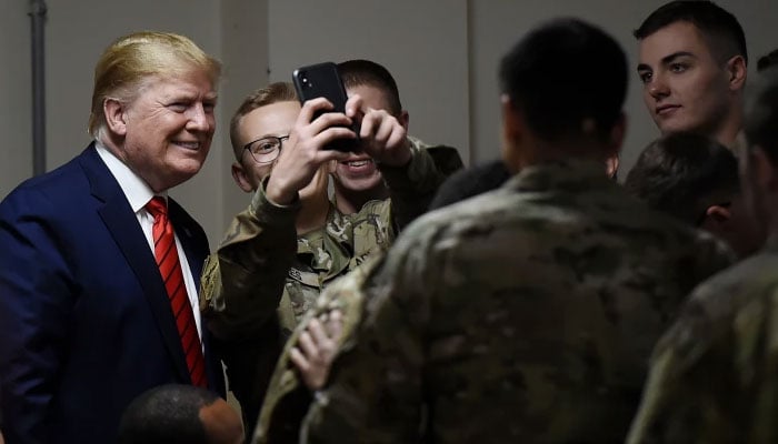 President-elect Donald Trump pictured with US Army personnel in this undated image. — AFP/File