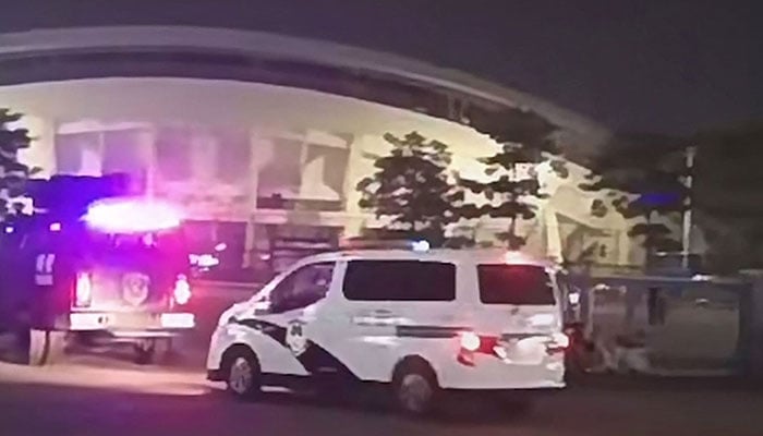 This image grab from a UGC video posted on November 11, 2024 shows emergency vehicles arriving after a driver ploughed through a crowd of people exercising at a sports center in Zhuhai, China. — AFP