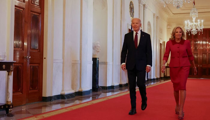 US President Joe Biden and first lady Jill Biden walk to an event on the day he meets with President-elect Donald Trump at the White House in Washington, US, November 13, 2024. — Reuters