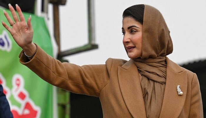 Maryam Nawaz waves to her supporters during an election campaign rally at Mansehra in KP on January 22, 2024.— AFP