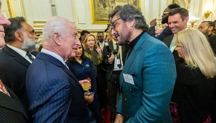 Pakistani actor Adnan Siddiqui (right) speaks to King Charles III during a recpetion at the Buckingham Palace in London, United Kingdom on November 13, 2024. — Instagram/@adnansid1