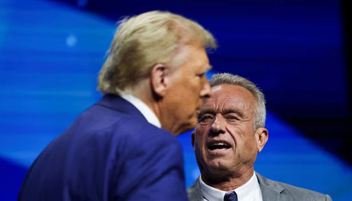 Robert F Kennedy Jr and Donald Trump attend a campaign event sponsored by conservative group Turning Point USA, in Duluth, Georgia, US, October 23, 2024. — Reuters