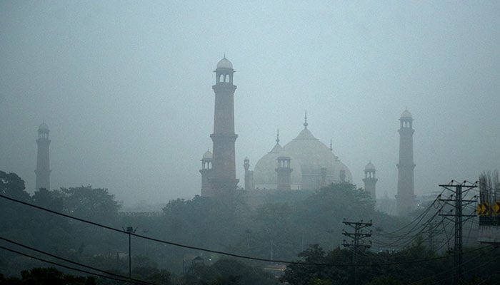 A view of the Mughal-era Badshahi Mosque amid smog and air pollution in Lahore, November 13, 2024. — Reuters