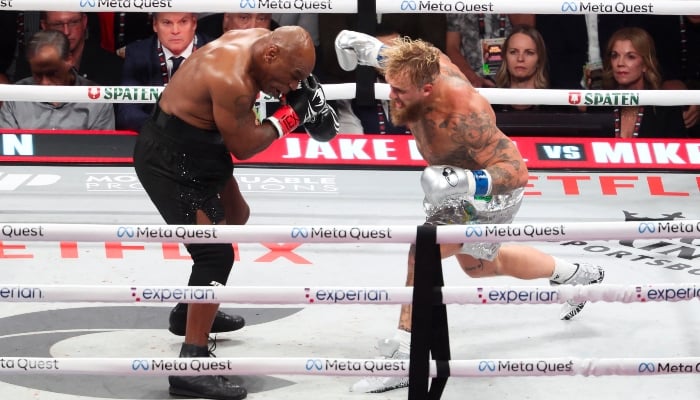 Mike Tyson (black gloves) fights Jake Paul (silver gloves) at AT&T Stadium in Arlington, Texas, United States, on November 15, 2024. —Reuters