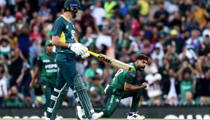 Pakistani bowler Haris Rauf (right) celebrates after taking a wicket as Australian batsman walks away at the Sydney Cricket Ground in Sydney, Australia, on November 16, 2024. —X/@TheRealPCB