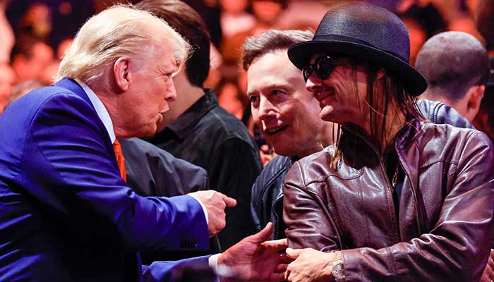 US President-elect Donald Trump (L) talks with Tesla and SpaceX CEO Elon Musk (C) and singer Kid Rock as they attend UFC 309 at Madison Square Garden in New York, on November 16, 2024. — AFP