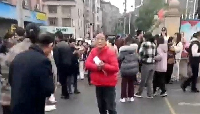 People gather following a vehicle collision outside a primary school in Changde, Hunan province, China in this screengrab obtained from social media video released November 19, 2024. — Reuters