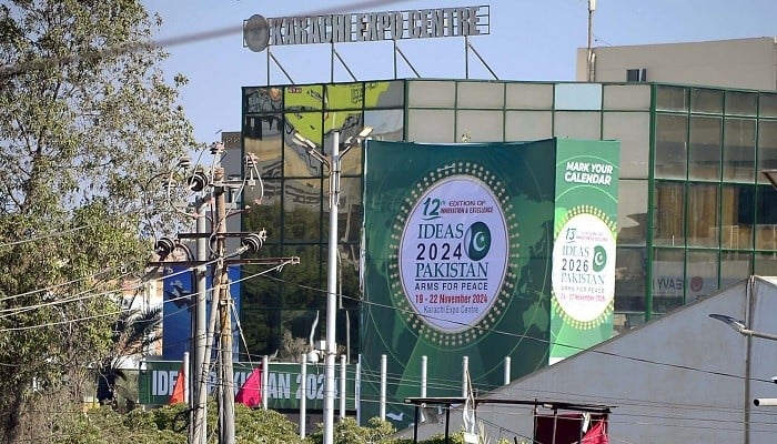 Banners and hoarding are hanging for the advertising of the 12th Edition IDEAS 2024, outside Expo Centre building in Karachi on Monday, November 11, 2024. — PPI