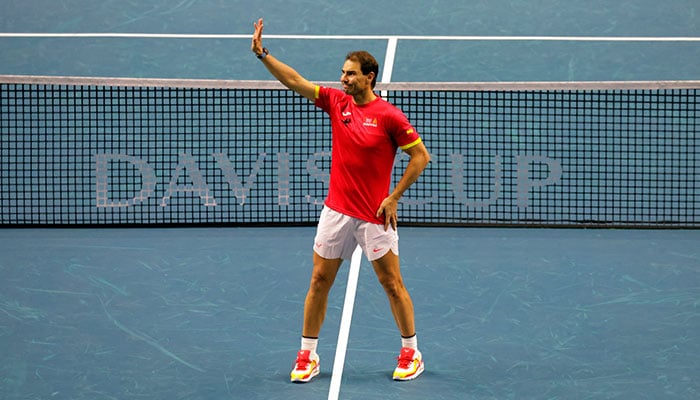 Spains Rafael Nadal waves at fans during a tribute to his career after The Netherlands eliminated Spain in Davis Cup quarterfinal in Malaga on November 20, 2024. — Reuters