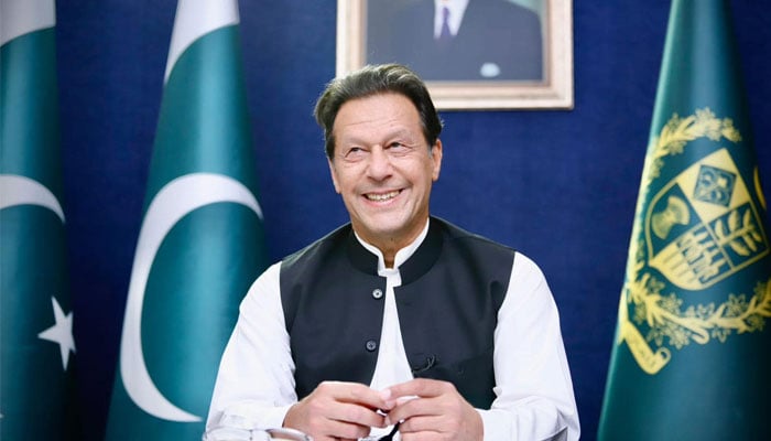 Pakistan Tehreek-e-Insaf (PTI) founder Imran Khan smiles as he addresses a press conference in this undated image. — Facebook/@ImranKhanOfficial