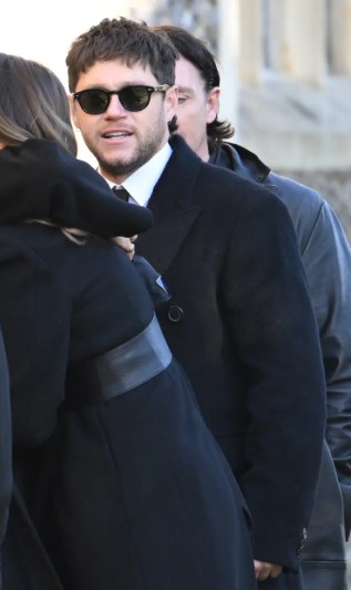 Niall Horan was spotted at former bandmates funeral.