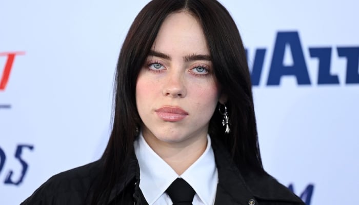 Billie Eilish stands next to Beyonce with seven nominations