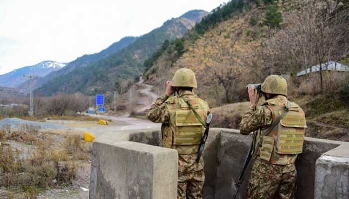 Pakistan military soldiers stand guard. — Reuters/File