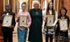 Queen Camilla awards young leaders at Buckingham Palace