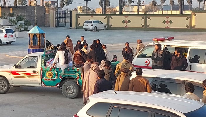 In this representational image people gather near an ambulance in Khyber Pakhtunkhwa’s Kurram district. — supplied