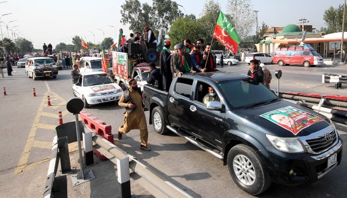 Leaders, activists and supporters of Pakistan Tehreek-e-Insaf (PTI) are holding a protest rally as they are moving towards Islamabad via motorway road in Peshawar on November 24, 2024. PPI