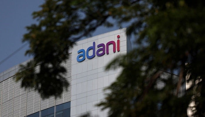 The logo of the Adani Group is seen on the facade of its Corporate House on the outskirts of Ahmedabad, India, November 21, 2024. — Reuters