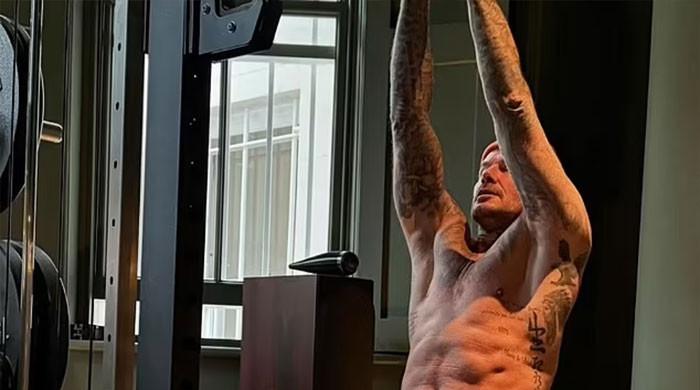 Victoria Beckham captures David’s shirtless workout in home gym