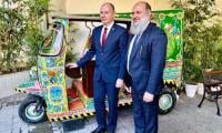 Belarusian Minister Admires Pakistani Handcrafted Rickshaw 