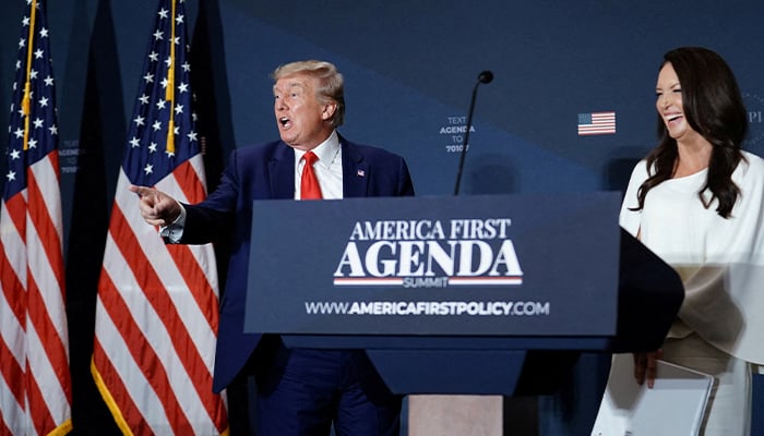 President-elect Donald Trump (L) pictured with Brooke Rollins at the America First Policy Institute America First Agenda Summit in Washington, US on July 26, 2022. — Reuters