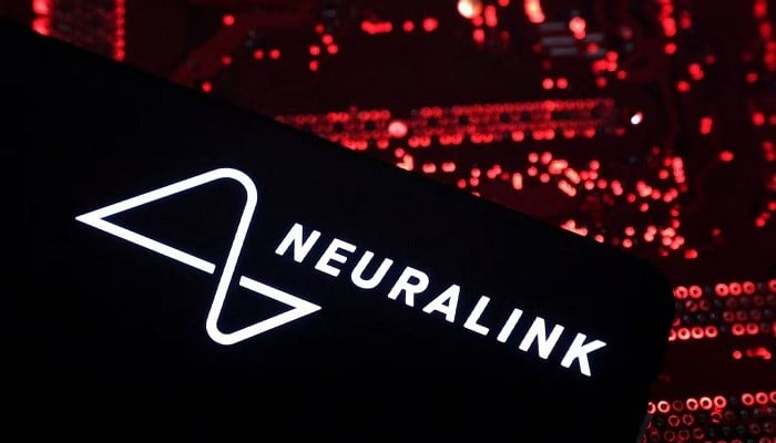 A smartphone with a Neuralink logo displayed is placed on a computer motherboard in this illustration taken on May 15, 2024. — Reuters