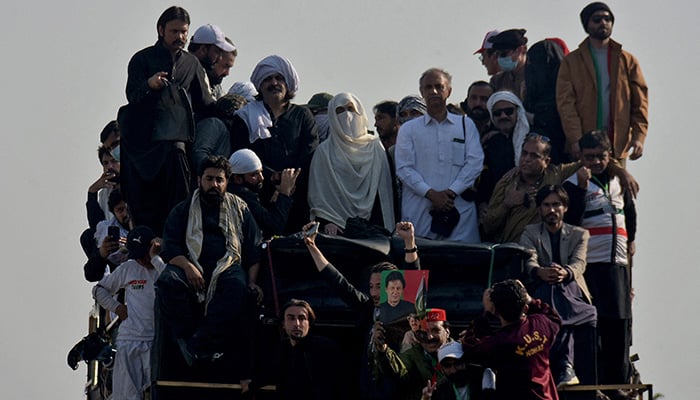 Bushra Bibi, wife of jailed former prime minister Imran Khan and PTI supporters attend a rally demanding his release, in Islamabad, Pakistan, November 26, 2024. — Reuters