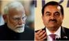 'Let him defend himself', says BJP about Adani amid opposition protests