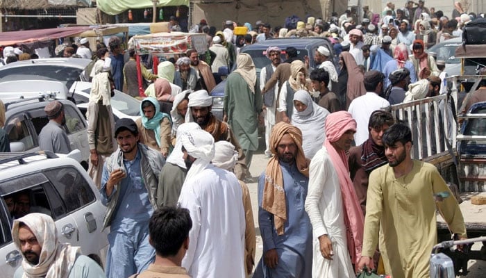 People arriving from Afghanistan gather at the Friendship Gate crossing point in the Pakistan-Afghanistan border town of Chaman, Pakistan August 27, 2021. — Reuters