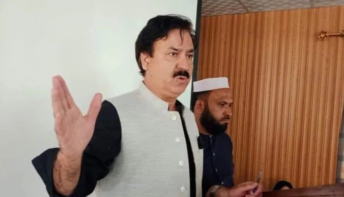 Former provincial minister and leader of Pakistan Tehreek-e-Insaf (PTI) Shaukat Yousafzai gestures while addressing an event on May 17, 2024. — Facebook/Shaukat Yousafzai