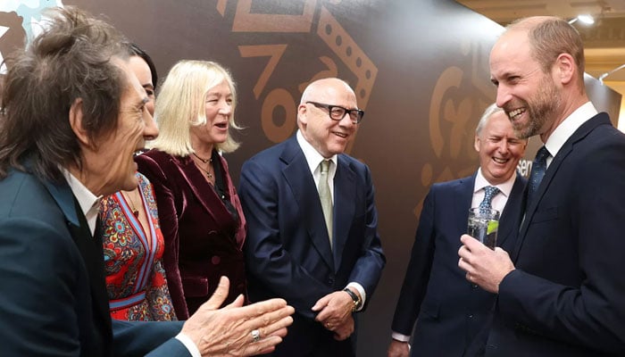 Ronnie Wood, Sally Wood, Kitty Aldrigdge-Knopfler, Mark Knopfler and Prince William at the 12th Tusk Awards in London