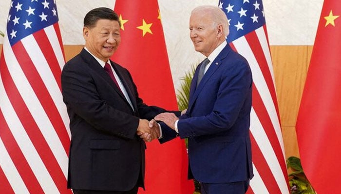 US President Joe Biden shakes hands with Chinese President Xi Jinping as they meet on the sidelines of the G20 leaders summit in Bali, Indonesia, November 14, 2022. — Reuters