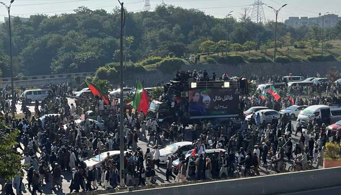 PTI supporters attend a rally in Islamabad demanding release of Imran Khan, on Nov 26, 2024. — Reuters