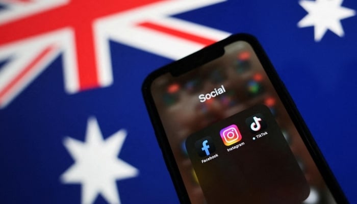 Facebook, TikTok and Instagram apps are seen on a smartphone in this illustration with Australian flag in the backdrop. —Reuters/ File