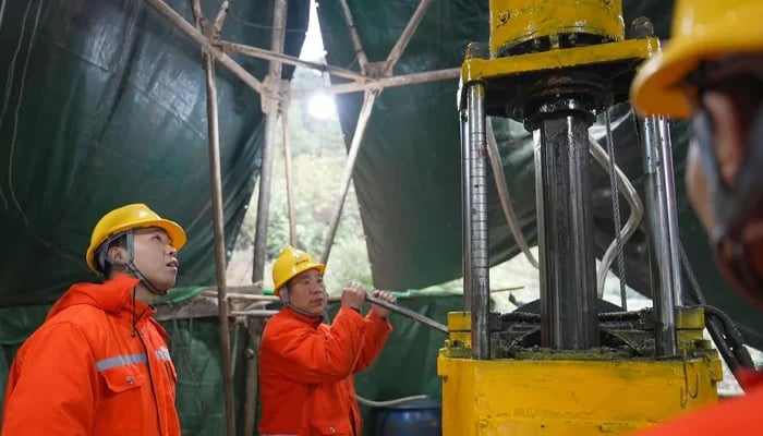 Mining experts drilled down around 6,600 feet below the ground and identified more than 40 veins of gold ore in ingjiang, Hunan province, China. — Xinua/file