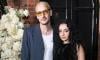 Charli XCX gets surprised by fiancé George Daniel at Brat concert